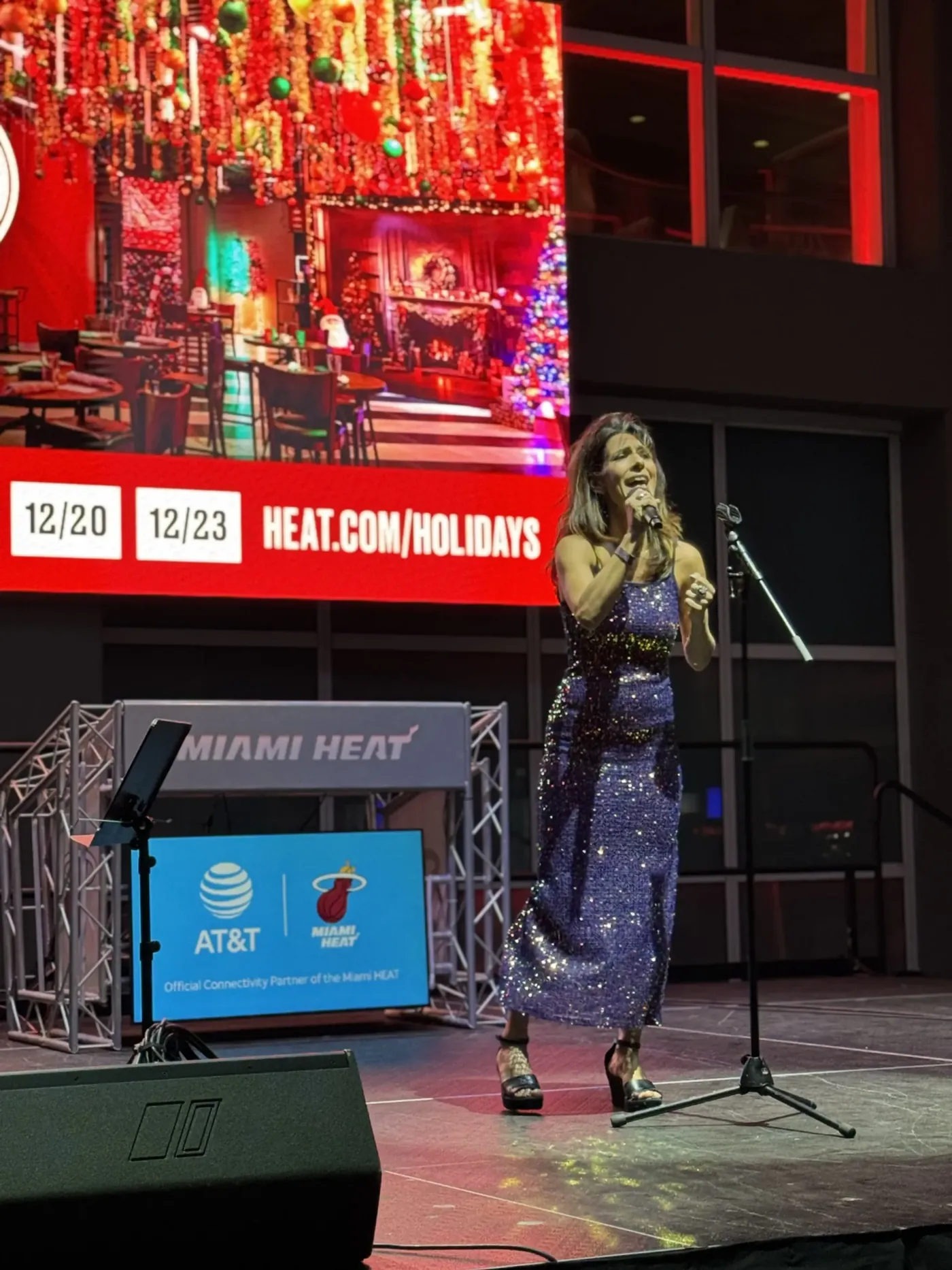 Student vocalist performing at a Miami HEAT game
